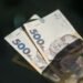 Украинцам начали выплачивать по 1500 гривен: кто получит деньги уже в апреле